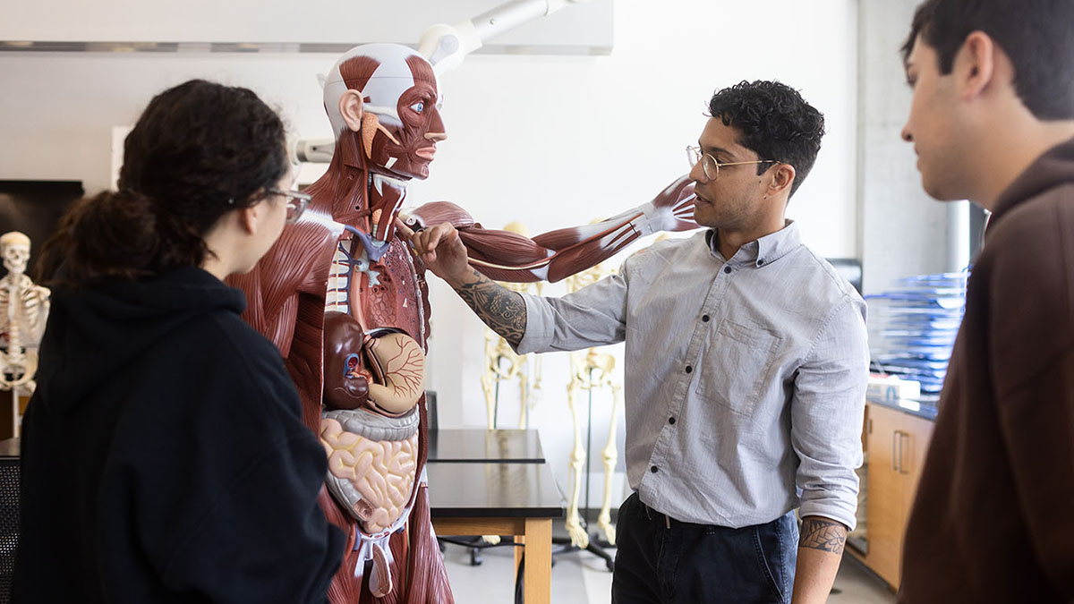 faculty and students in lab